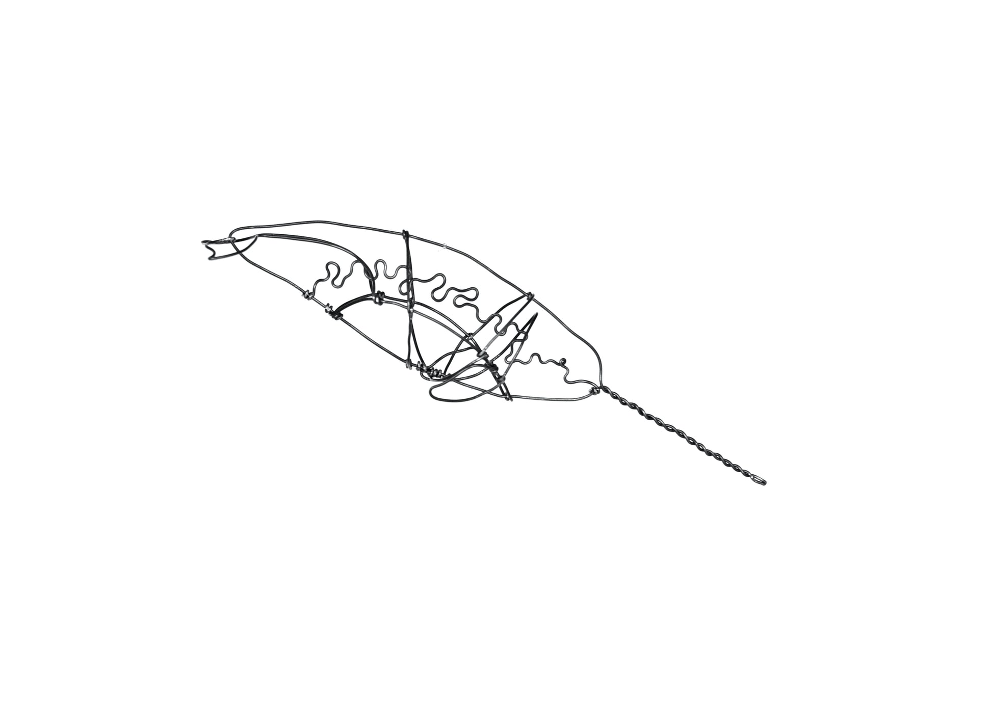 Photo of a 3D wire narwhal whale sculpture.