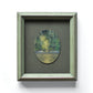 Small, framed oil painting of a whale's blow by Natasha van Netten