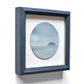 Small, framed oil painting of an island by Natasha van Netten 