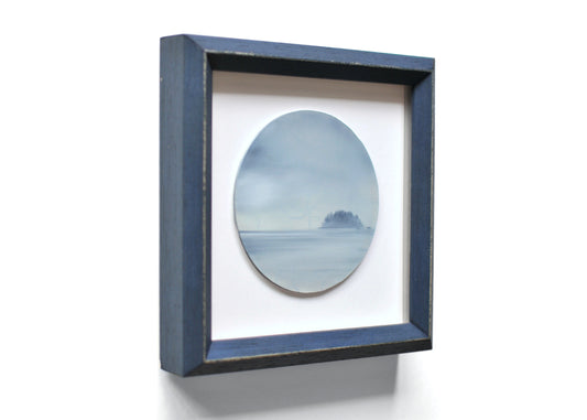 Small, framed oil painting of an island by Natasha van Netten 