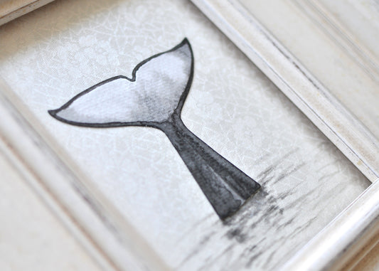 Ink painting of orca's tail mounted to silk 