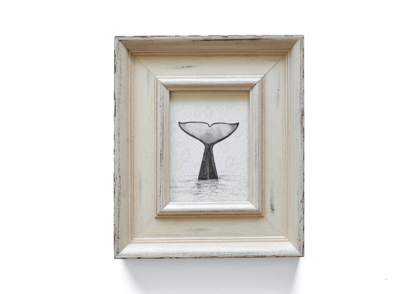 Ink painting of orca's tail mounted to silk 