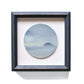 Small, framed oil painting of an island by Natasha van Netten 