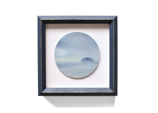 Small, framed oil painting of an island by Natasha van Netten 