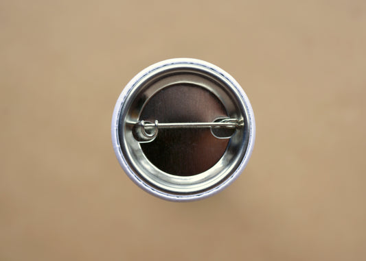 Photo of the back of the button.
