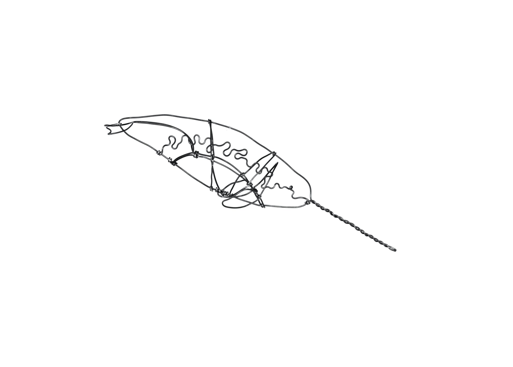 Photo of a 3D wire narwhal whale sculpture. 